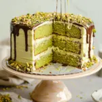 Two-Layer Pistachio Cake Recipe UK (with Cream Cheese Frosting & Chocolate Drizzle) Blog / Recipes / Two-Layer Pistachio Cake Recipe UK (with Cream Cheese Frosting & Chocolate Drizzle) Two-Layer Pistachio Cake Recipe UK